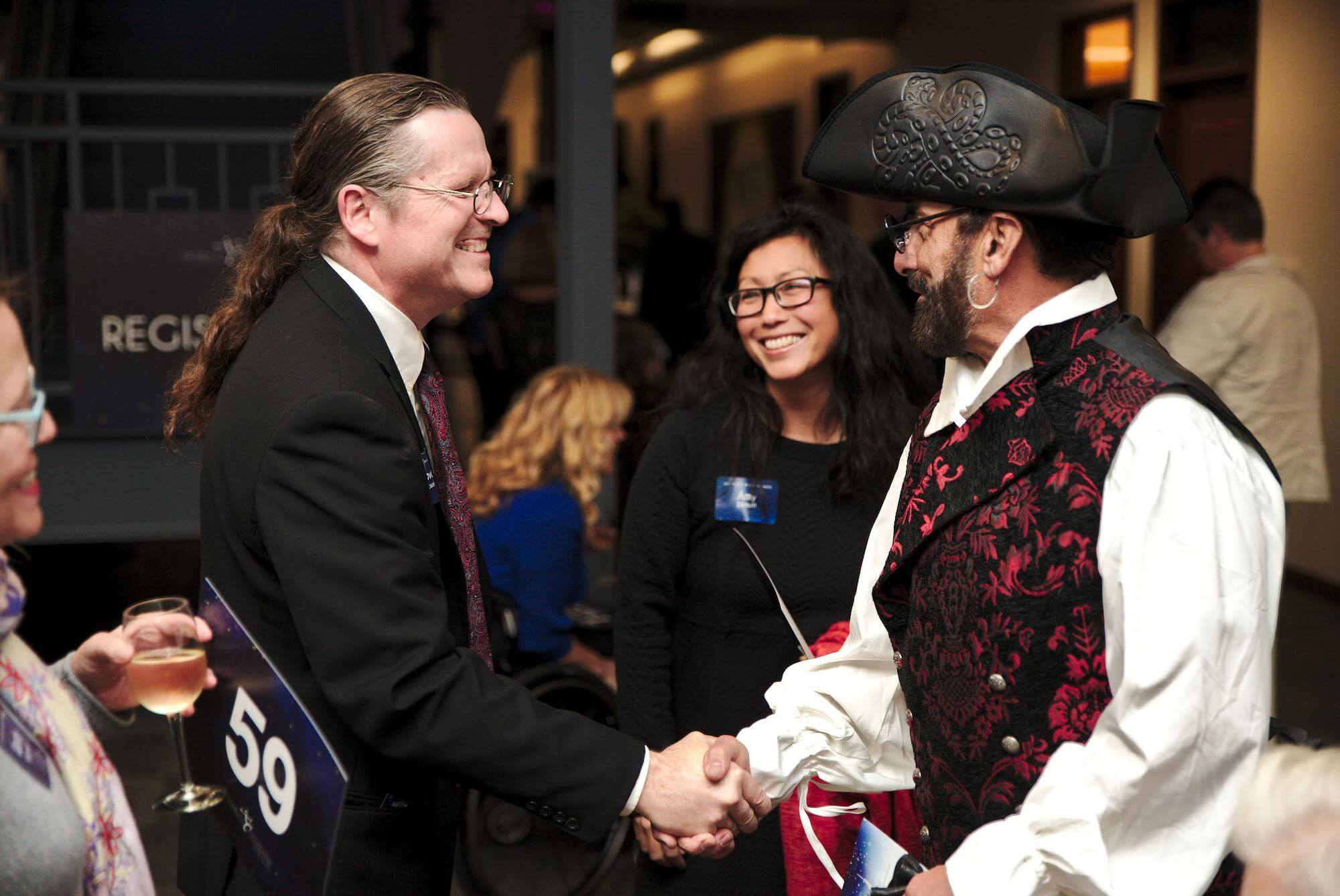 Man shakes hands with a pirate